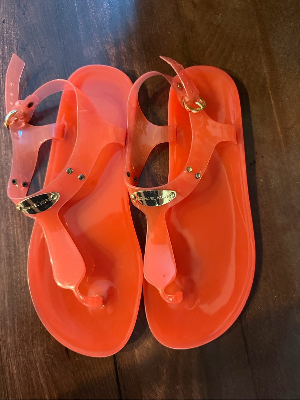 Michael Kors Bright Coral Jelly Thong Sandals with Gold Accents